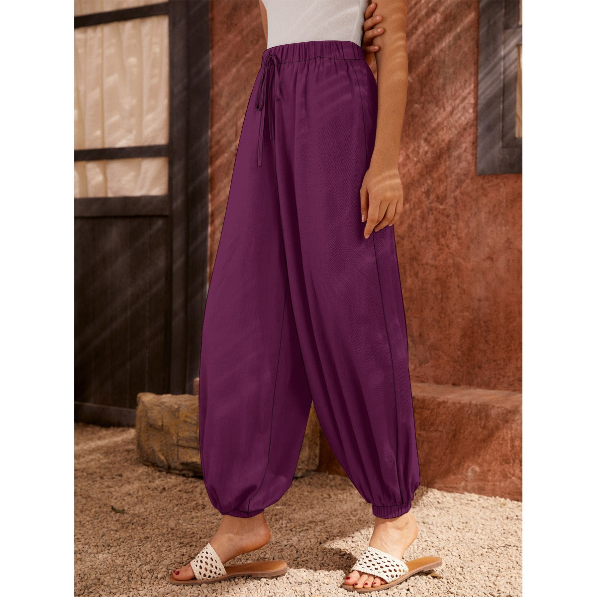 Pantaloni a carota da donna con stampa all-over