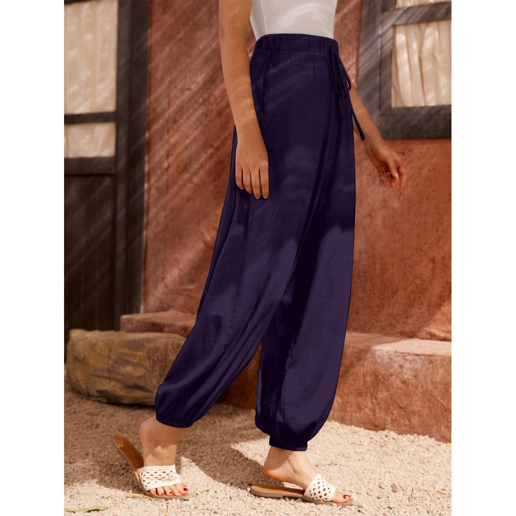Pantaloni a carota da donna con stampa all-over