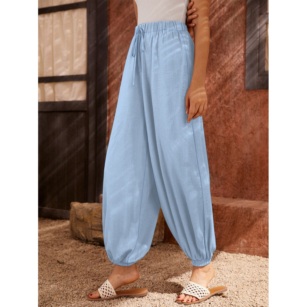 Pantaloni a carota da donna con stampa all-over
