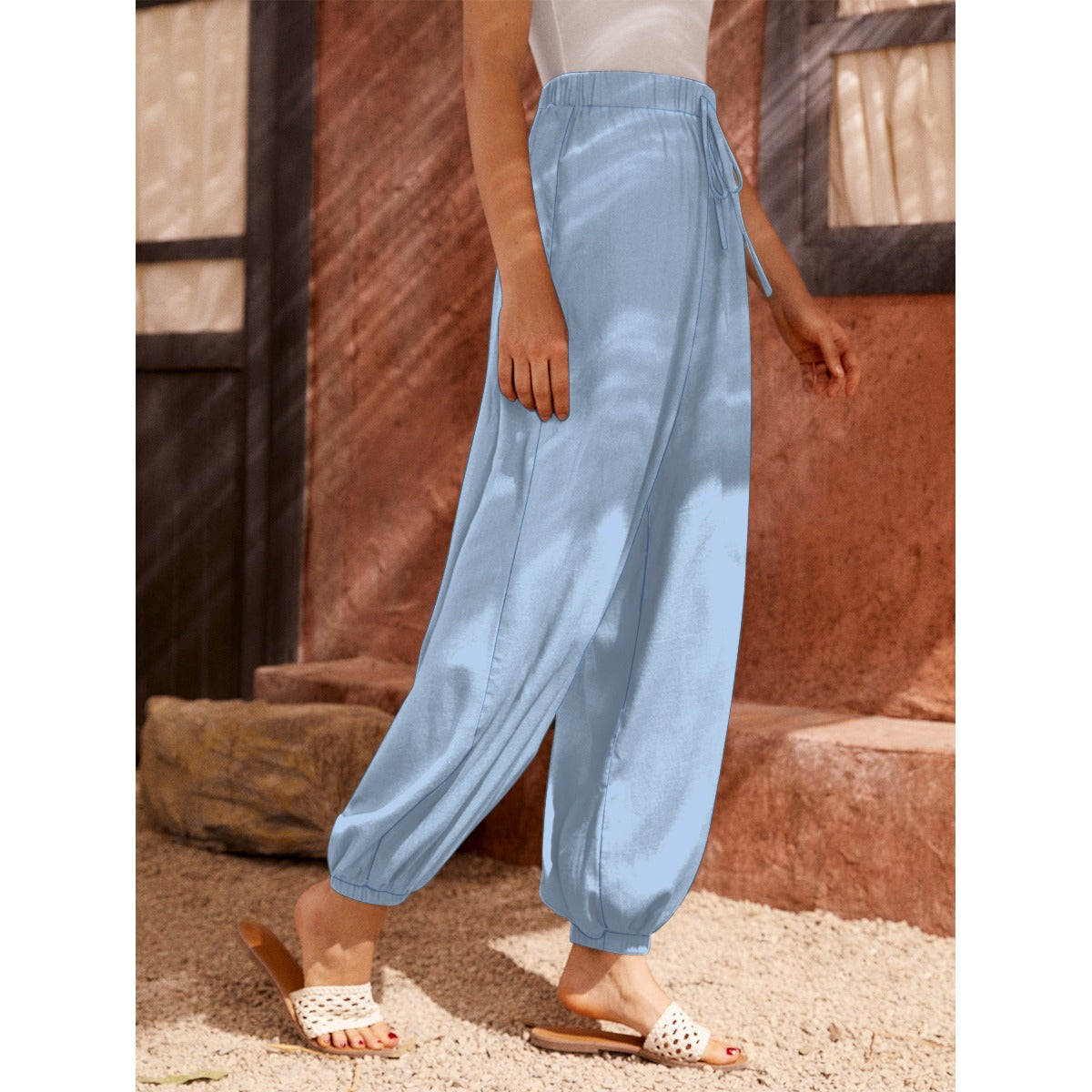 Pantaloni a carota da donna con stampa all-over