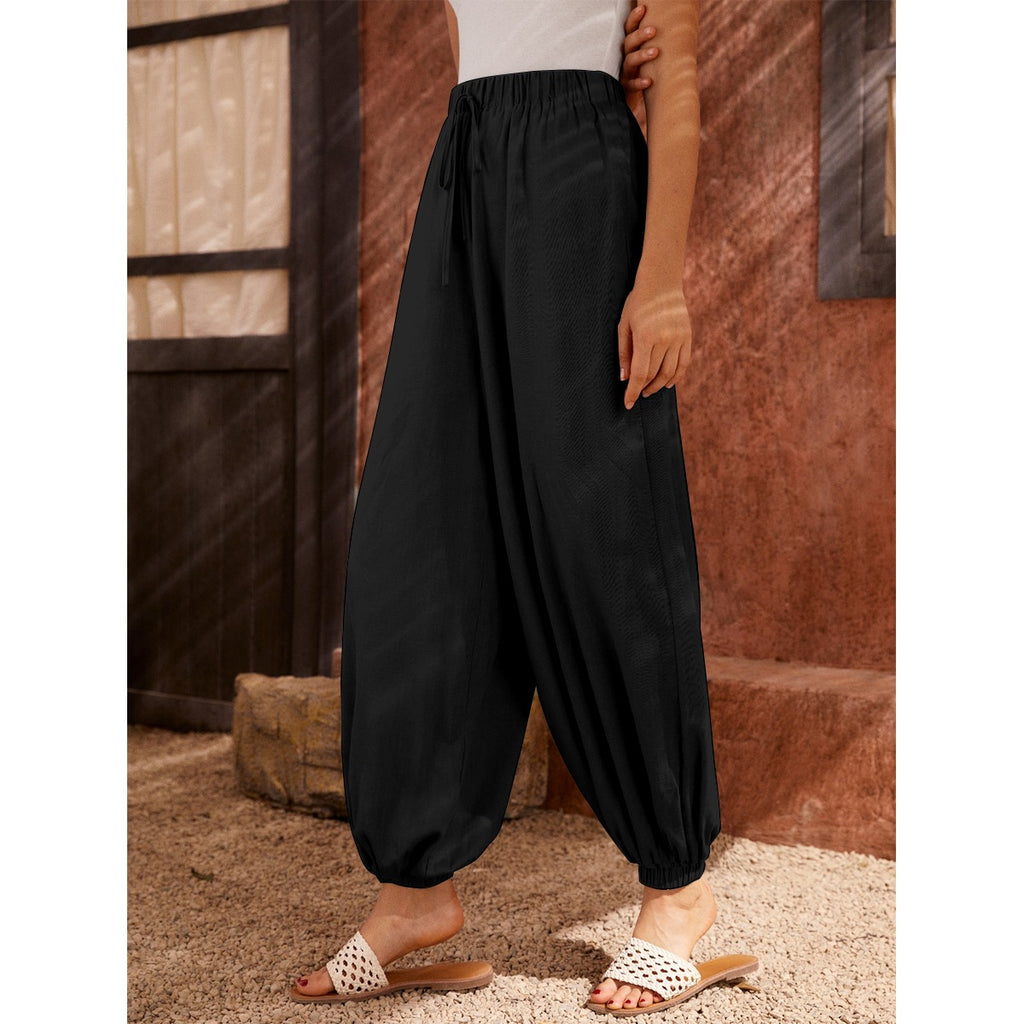 Pantaloni a carota da donna con stampa all-over