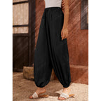 Pantaloni a carota da donna con stampa all-over
