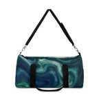 Teal swirl Printify duffel bag with ocean abstract design, spacious travel and gym bag with sturdy handles and zipper closure.