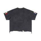 ODMPOD vintage wash boxy T-shirt with distressed hem, showcasing a relaxed fit and faded, worn-in style.
